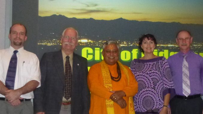 Just before the Ridgecrest City Council Hindu invocation, from left to right, are — Councilmember James Sanders, Mayor Daniel O. Clark, Hindu statesman Rajan Zed, Councilmember Lori Acton and Councilmember Steven P. Morgan.